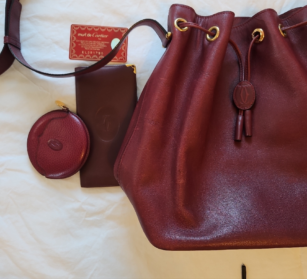 EUC Cartier Burgundy Leather Drawstring Bag, wallet and coin purse included